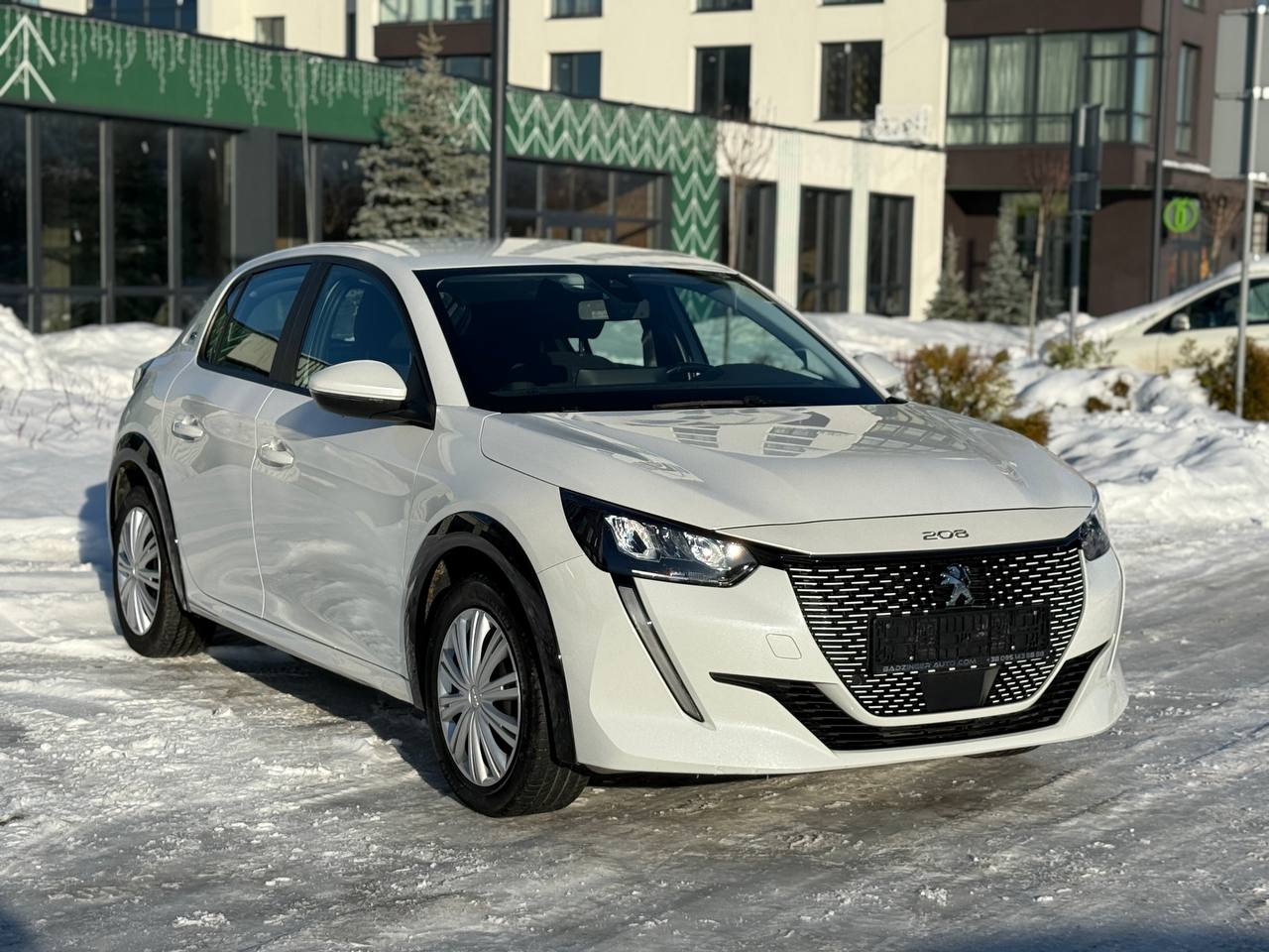 Фото - Peugeot e-208 #3