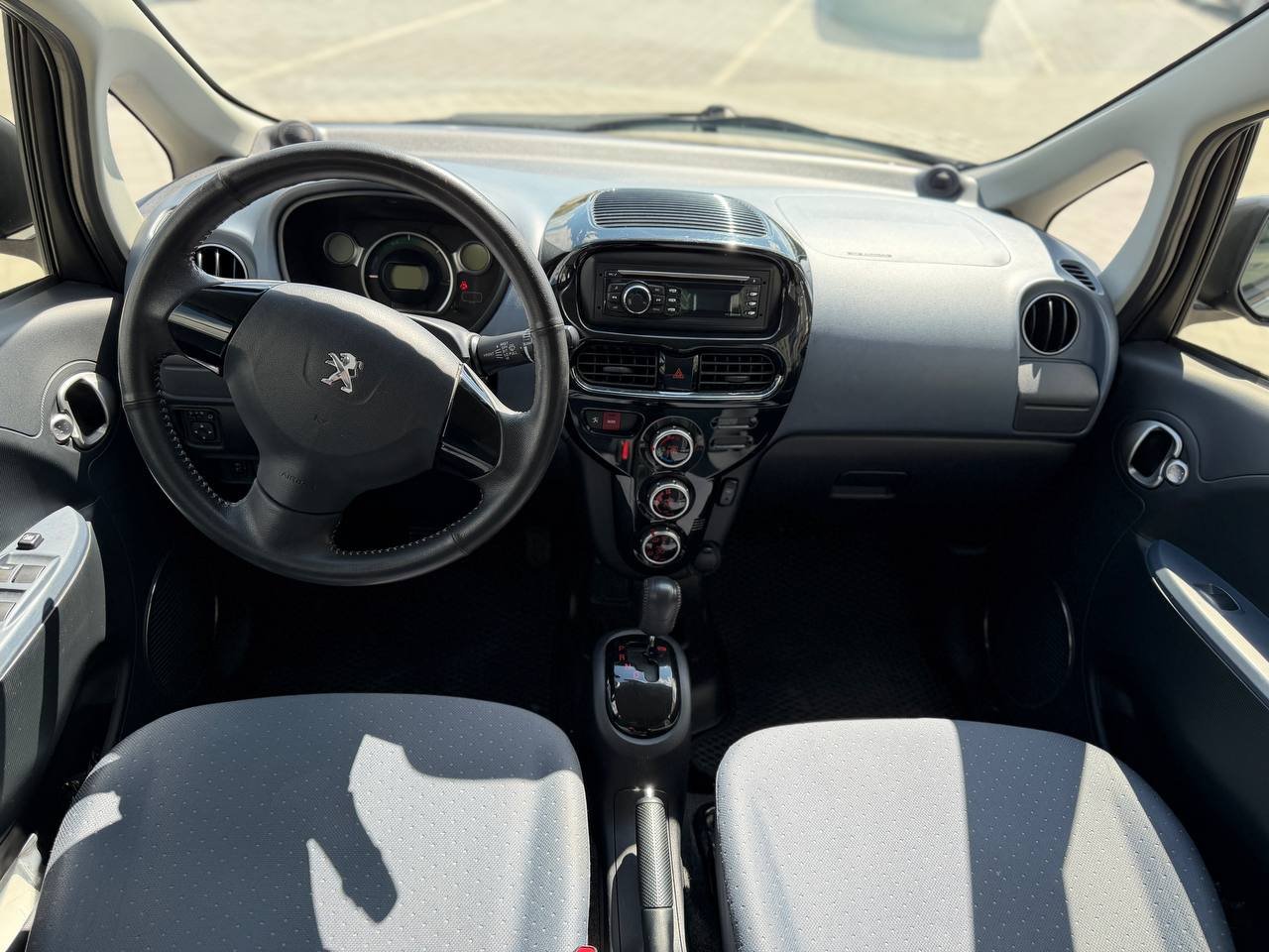 Фото - Peugeot Ion #9